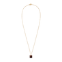 A gold chain necklace with a in a small, square shaped pendant on a white background.